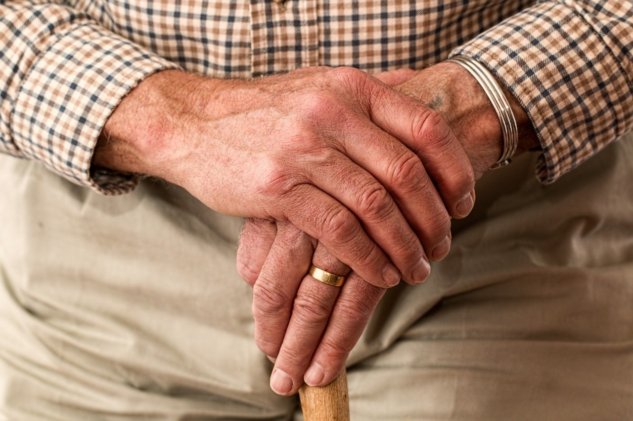 Closeup of wrinkled hands of a aged senior citizen